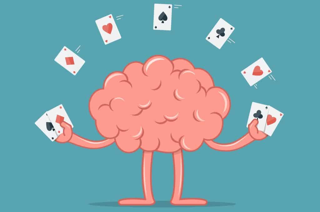 Illustration of a brain holding playing cards with other playing cards above it