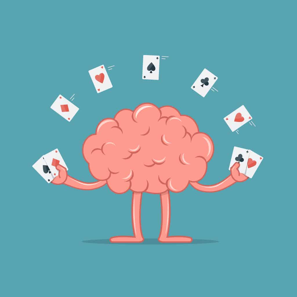 Illustration of a brain holding playing cards with other playing cards above it